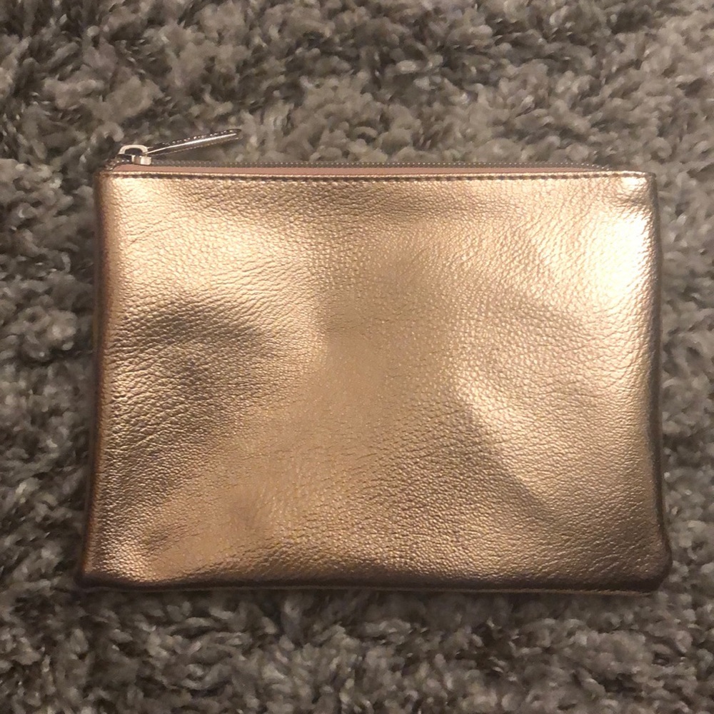 Gold makeup bag